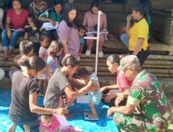Peduli Kesehatan Generasi,Babinsa 1613 – 01/Loli Berikan Pendampingan Bulan Penimbangan Balita